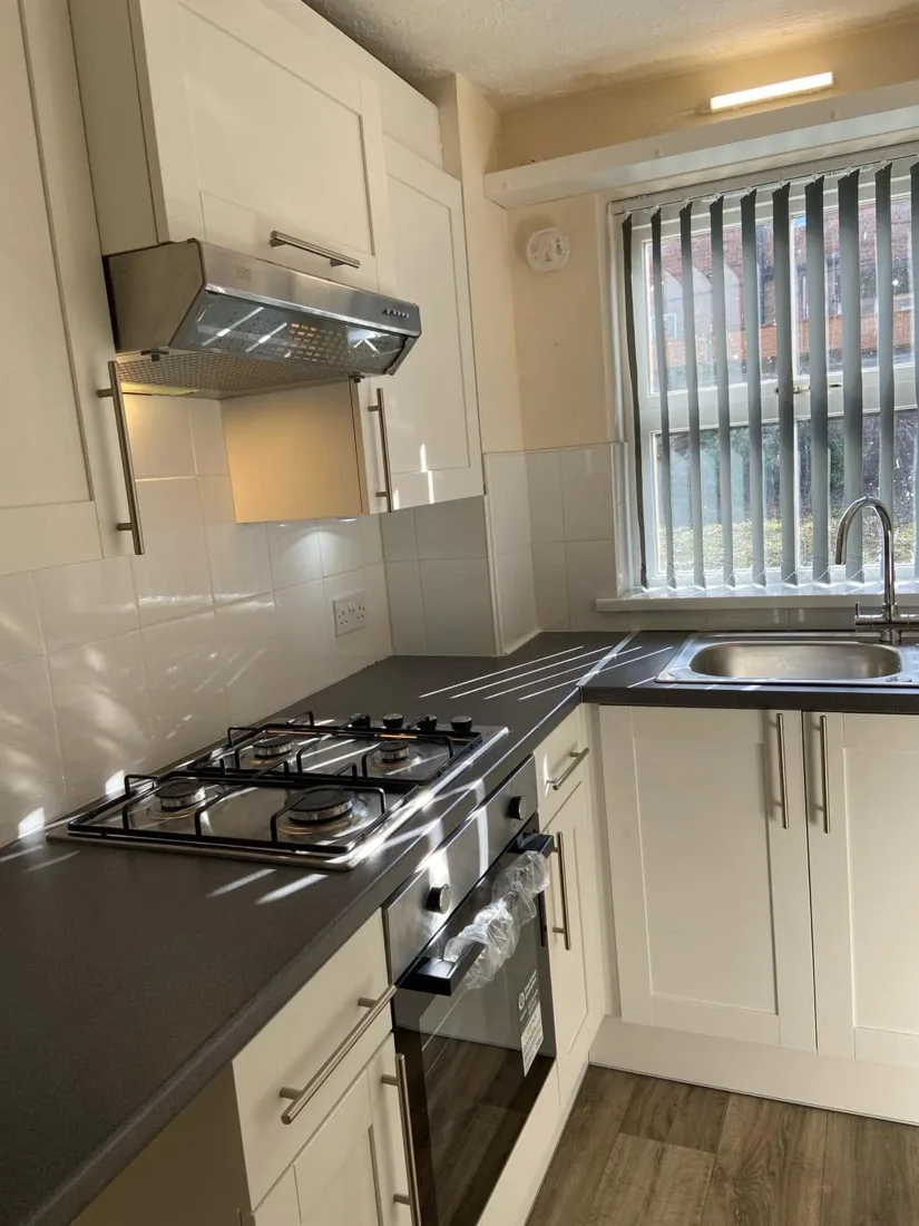 White kitchen worktop with gas hob installation