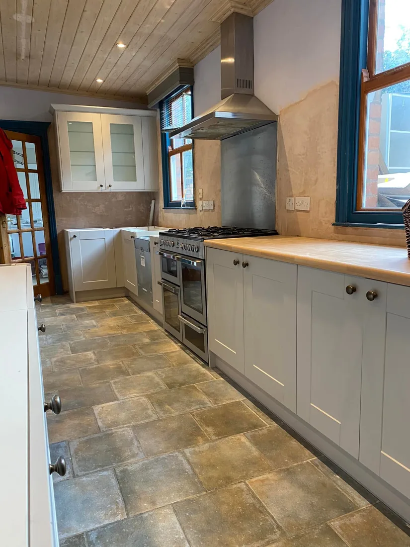 Kitchen fitting in progress with range cooker